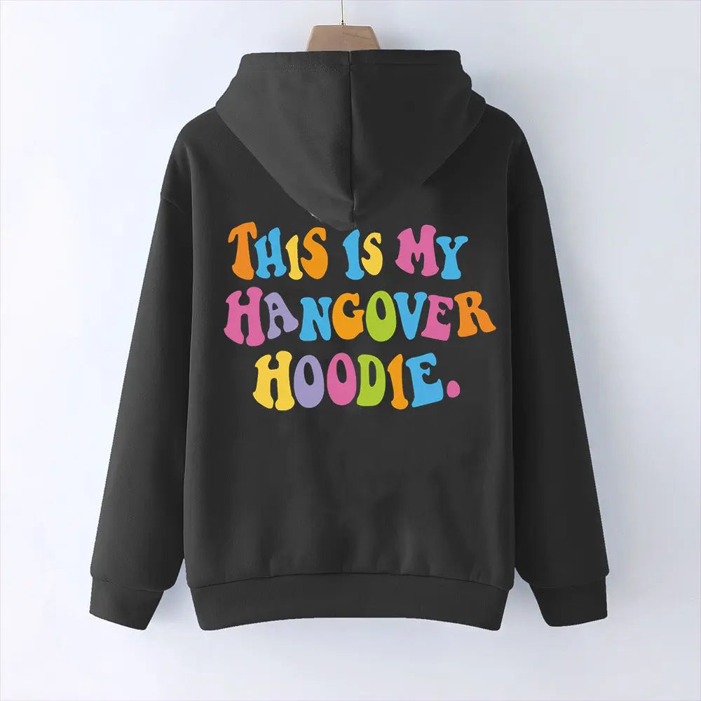 Black oversized women's hoodie with colorful "THIS IS MY HANGOVER HOODIE" back print and drop shoulder design