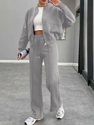 Gray baseball collar zip up outerwear and drawstring pants set for women with a sporty, casual style