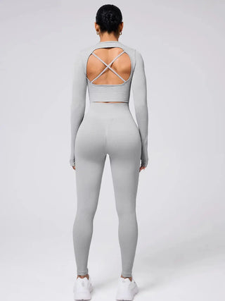 Back crisscross round neck long sleeve top and leggings active set in light grey shown from back