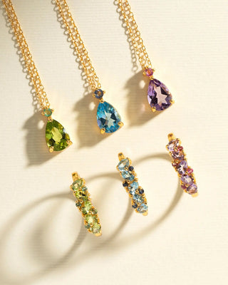 Blue sapphire and blue topaz pear cut pendant and matching gemstone earrings in gold vermeil settings