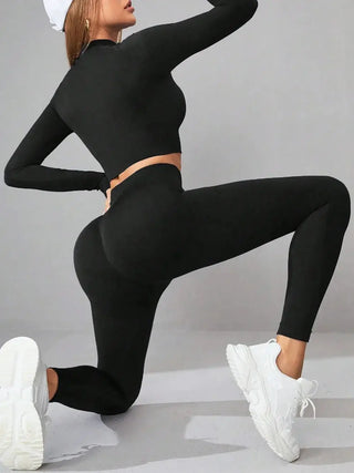 black mock neck long sleeve top and leggings active set with white sneakers