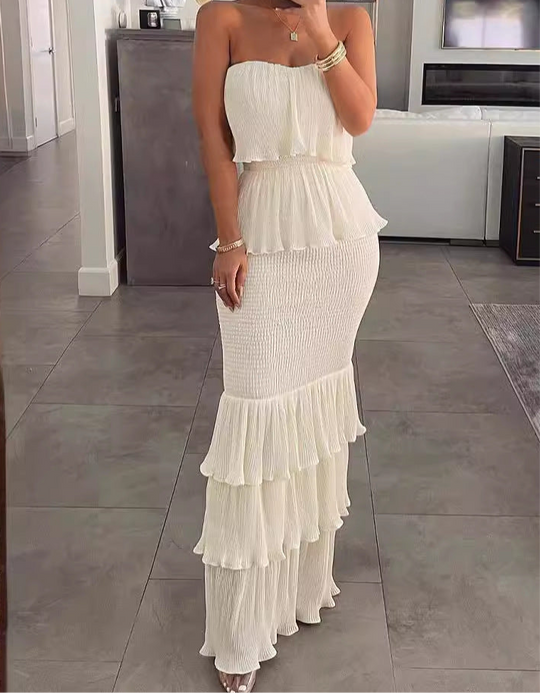 Strapless ruffle maxi dress in elegant, flowy design.