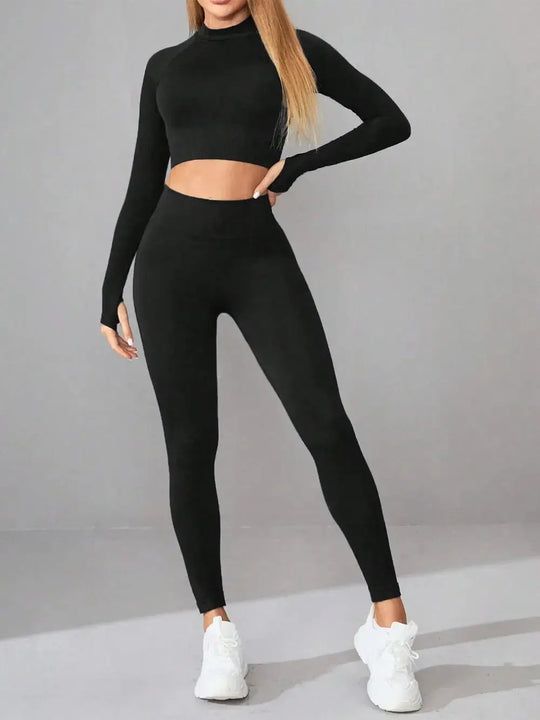 woman wearing black mock neck long sleeve top and leggings active set