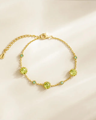 Emerald and peridot bracelet in 18k gold vermeil with round cut green gemstones on adjustable chain