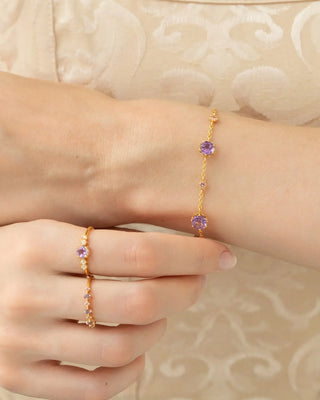 Lavender Amethyst Five Stone Ring in 18k gold vermeil with natural round cut gemstones and simulated diamonds on hand model
