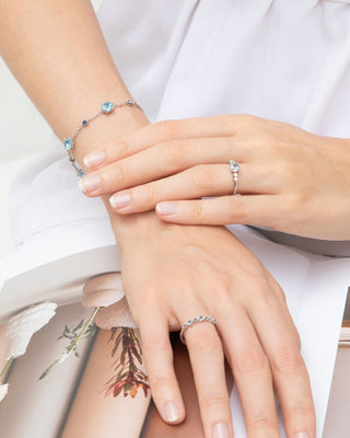 Blue Topaz Everyday Jewellery Set featuring sterling silver necklace, rings, and bracelet with sky blue topaz gemstones