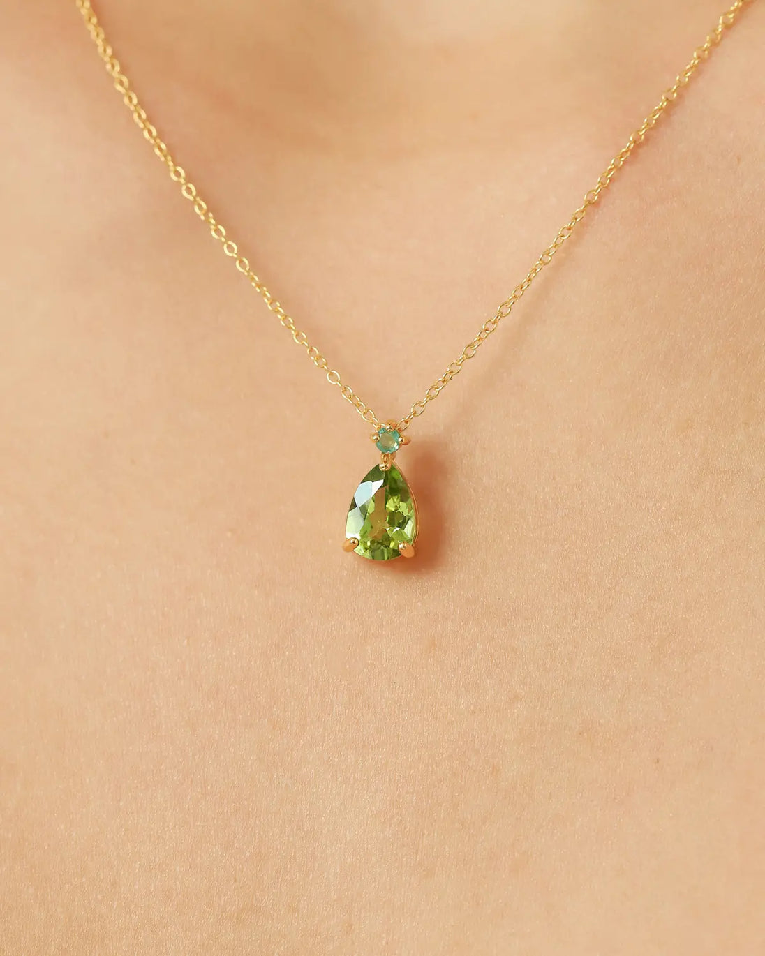 Emerald & Peridot pear cut pendant necklace in 18k gold vermeil on skin