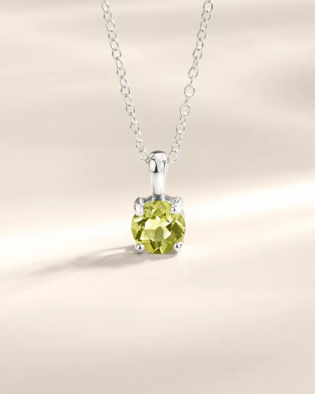 Sterling silver necklace with round cut peridot pendant for everyday wear