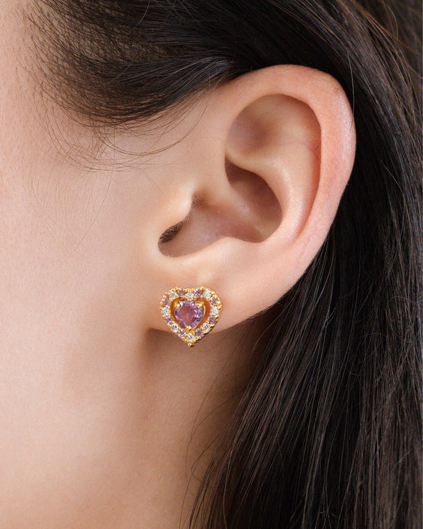 Close-up of purple heart lavender amethyst stud earring in 18k gold vermeil worn on ear