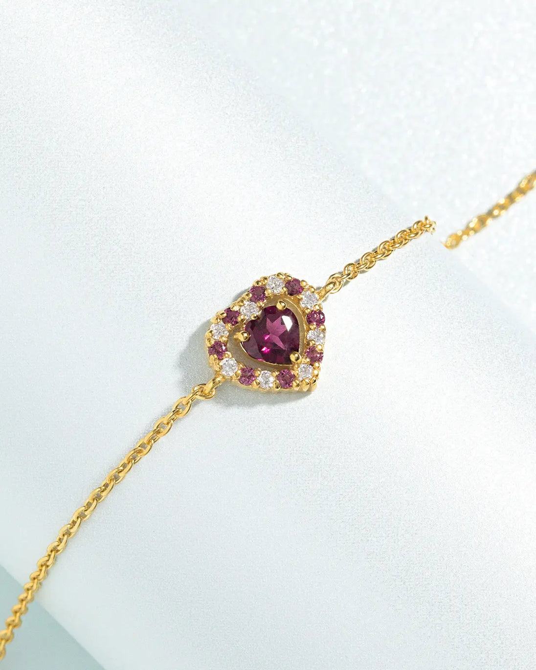 Red heart rhodolite garnet bracelet in 18k gold vermeil with pink rhodolites and simulated diamonds
