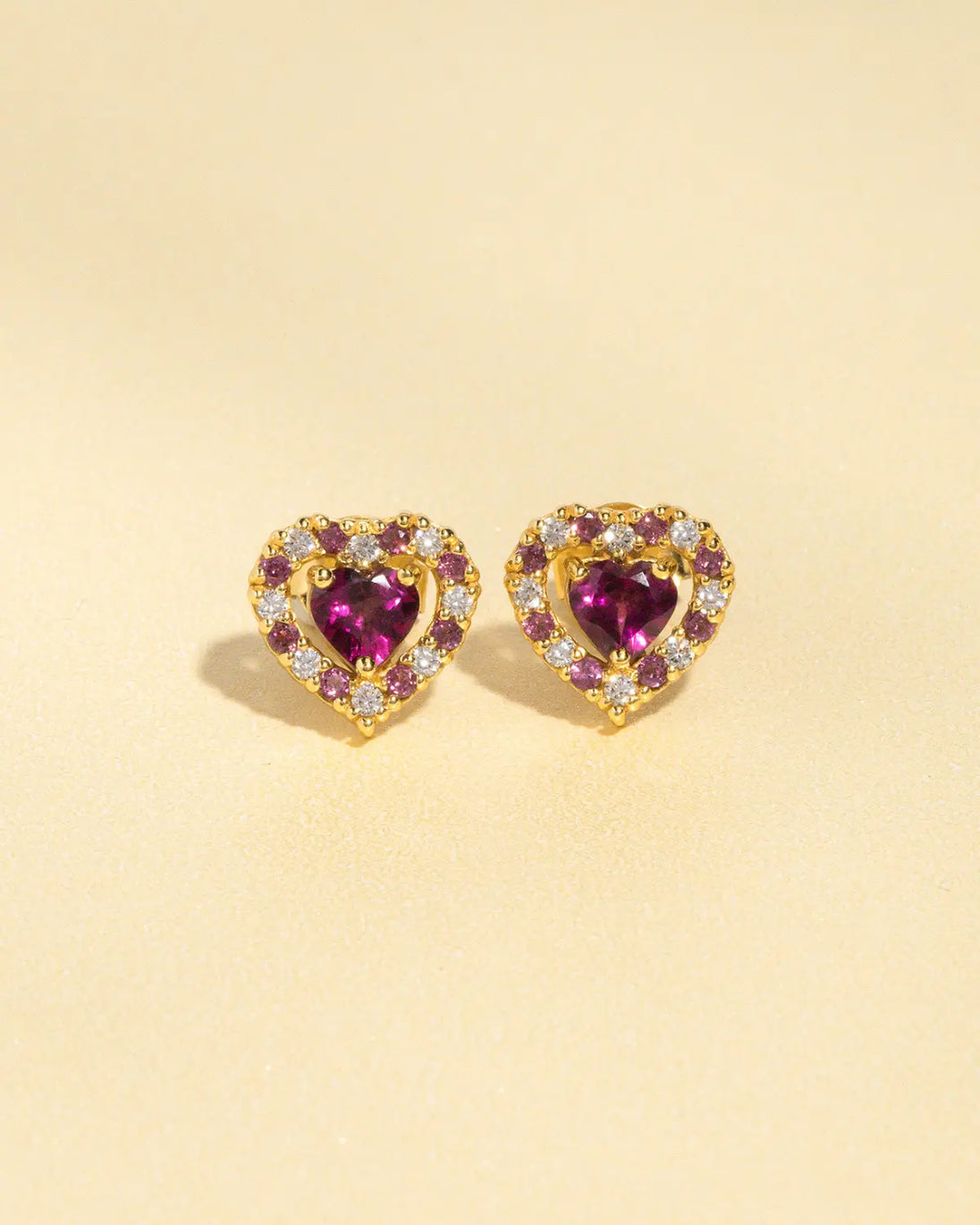 Red heart rhodolite garnet stud earrings in 18k gold vermeil with simulated diamonds