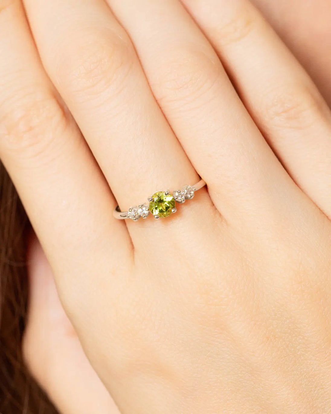 Sterling silver peridot ring with round cut green gemstone and diamond accents, part of Peridot Everyday Jewellery set
