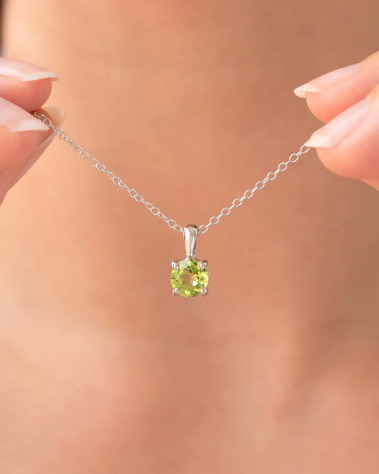 Sterling silver peridot everyday jewellery necklace with round cut green gemstone pendant