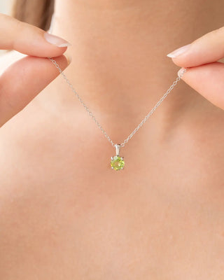 Peridot Everyday Jewellery set featuring sterling silver necklace with round cut peridot pendant