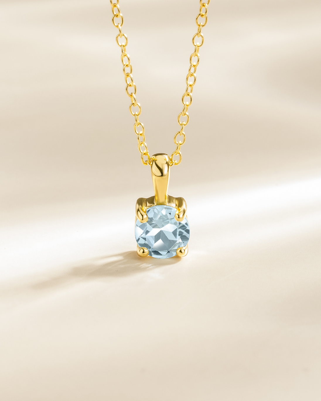 18k gold vermeil necklace with round cut sky blue topaz pendant handcrafted blue topaz jewelry