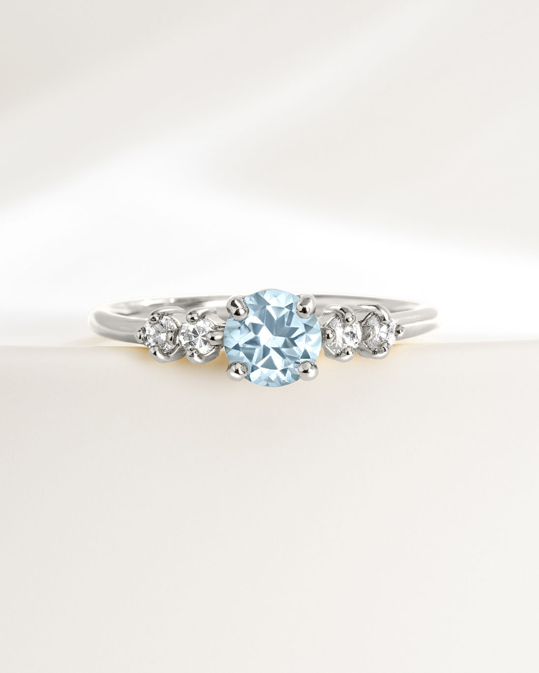 Sterling silver ring with round cut sky blue topaz and simulated diamonds from Blue Topaz Everyday Jewellery Set