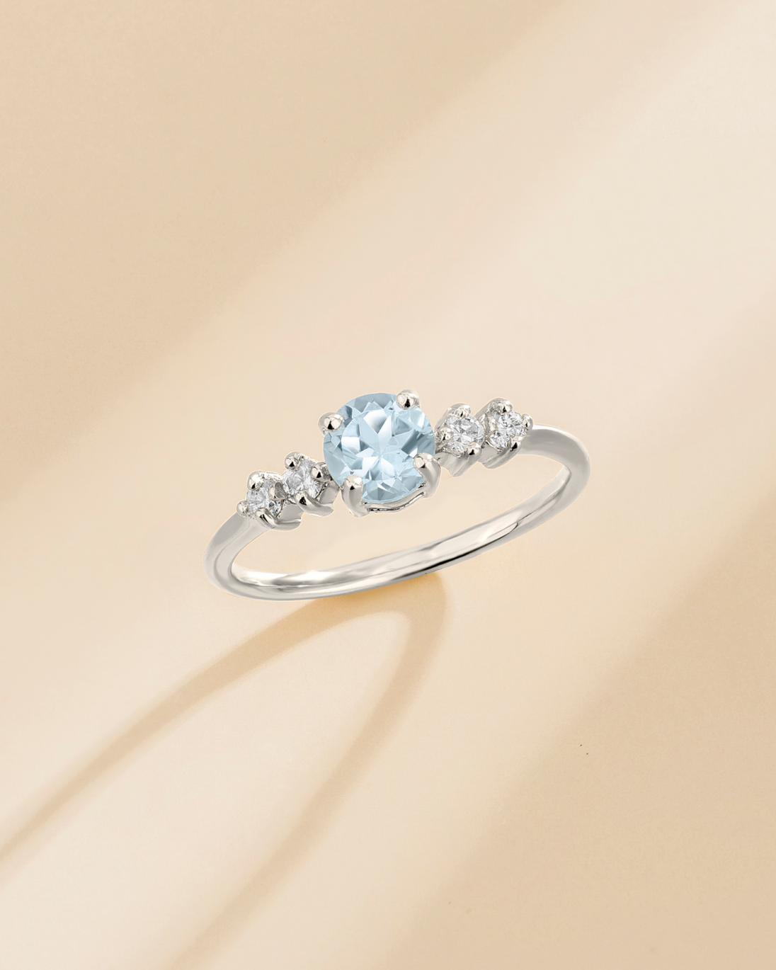 Sterling silver ring with round cut sky blue topaz and simulated diamonds from blue topaz everyday jewellery set