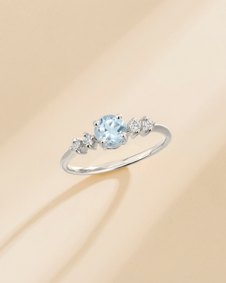 Sterling silver ring with round cut sky blue topaz and simulated diamonds from blue topaz everyday jewellery set