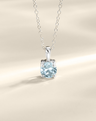 Sterling silver necklace with round cut sky blue topaz pendant from blue topaz everyday jewellery set