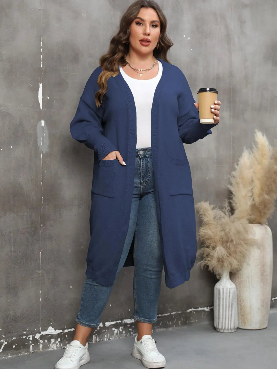 Plus size long sleeve pocketed navy cardigan with open front and ribbed design