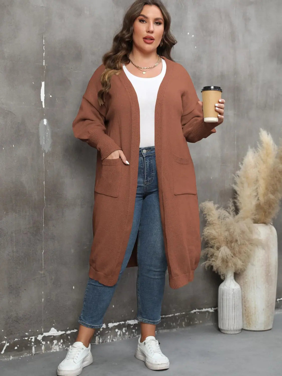 Plus size long sleeve pocketed cardigan in brown with open front and ribbed texture
