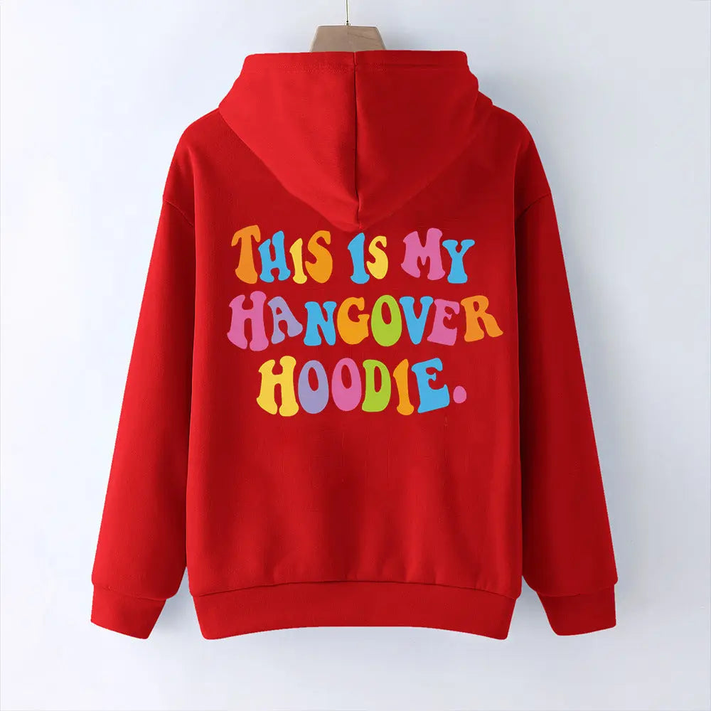 Red oversized women's hoodie with colorful "THIS IS MY HANGOVER HOODIE" back print and drop shoulder design