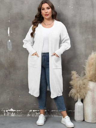Plus size long sleeve white cardigan with pockets and open front worn by model