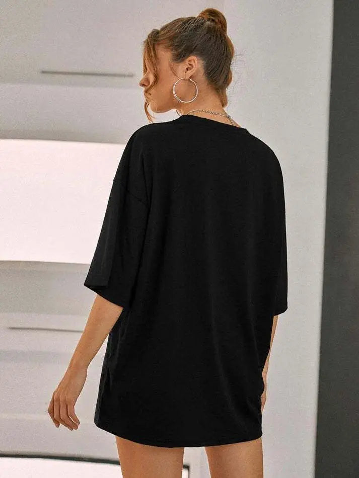 Ladies oversized Whisper Words of Wisdom black cotton short sleeve t-shirt top, casual and comfortable fit