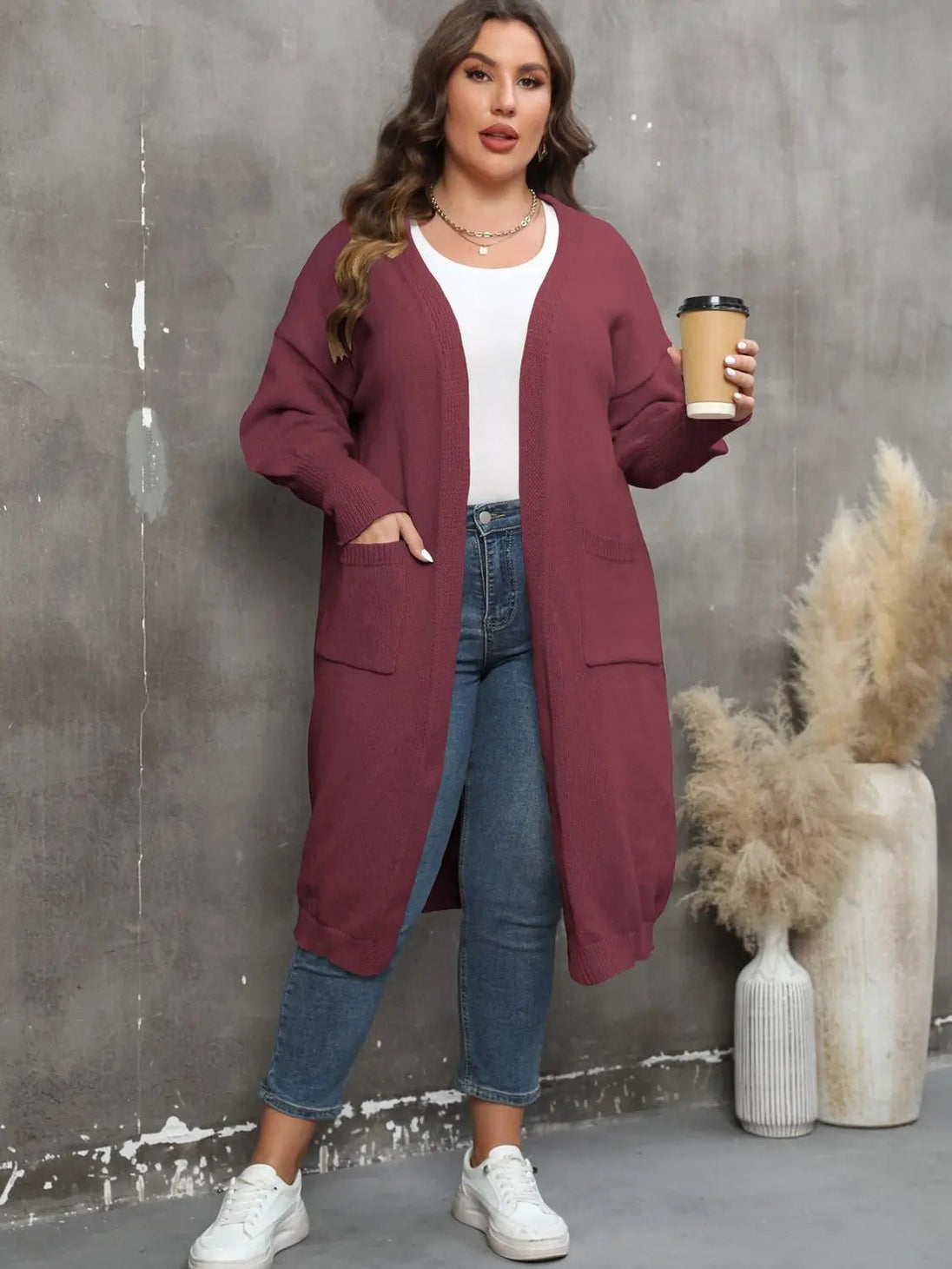 Plus size long sleeve ribbed cardigan with pockets in mauve worn with white top and jeans