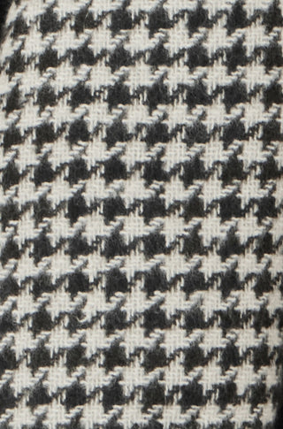 Yumi Black Dog Tooth Scarf with detailed stitch pattern in black and white polyester fabric