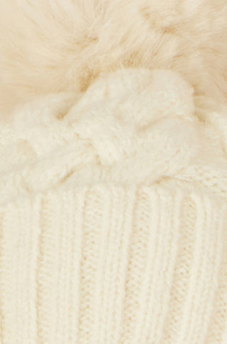 Yumi white cable knit bobble hat made of 100% nylon with hand wash care