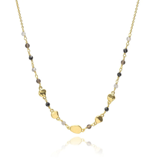 Sofia Nugget Necklace featuring black onyx, smoky quartz, labradorite, and 22k gold on recycled brass chain, adjustable length.