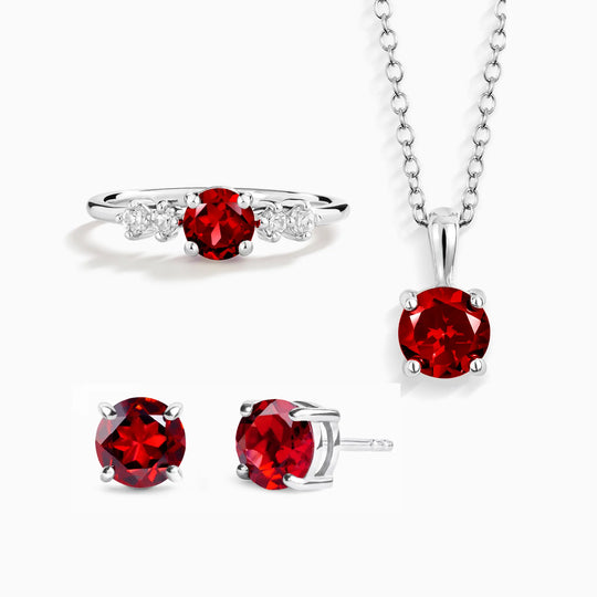 Sterling silver garnet everyday jewellery set with ring, necklace, and stud earrings