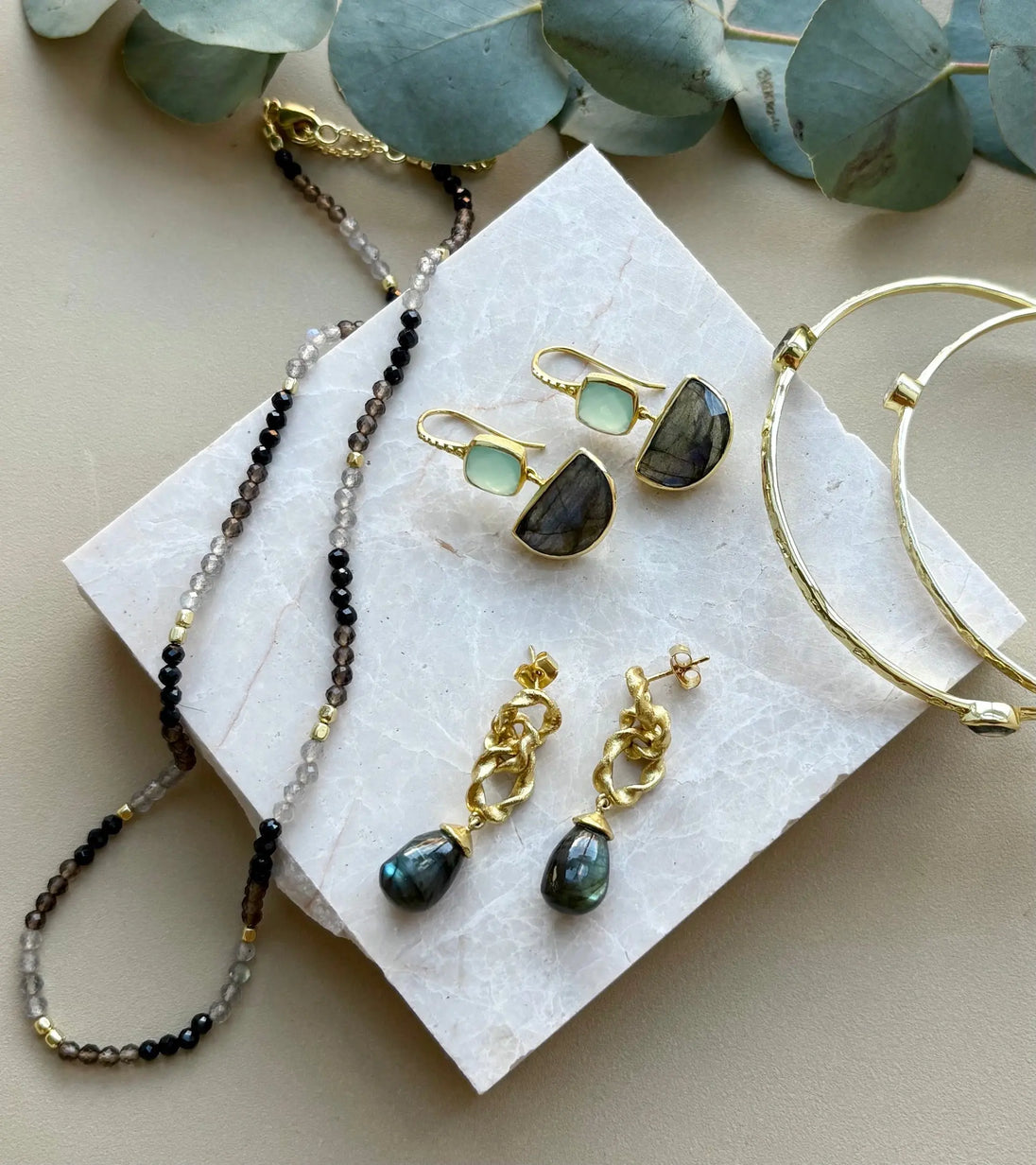 Milos Mixed Gemstone Beaded Necklace with black onyx, smoky quartz, and labradorite beads, 22k gold on recycled brass, adjustable length 16-18 inches