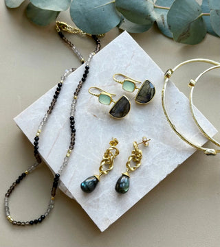 Milos Mixed Gemstone Beaded Necklace with black onyx, smoky quartz, and labradorite beads, 22k gold on recycled brass, adjustable length 16-18 inches