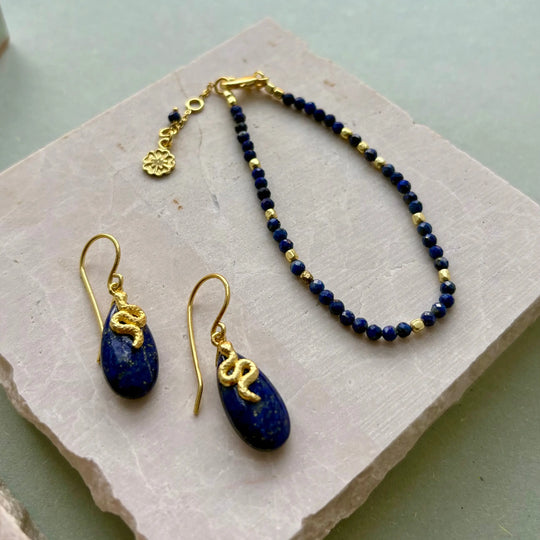 Milos Gemstone and Gold Bead Bracelet with lapis beads and 22K gold accents, adjustable length, artisan handcrafted.