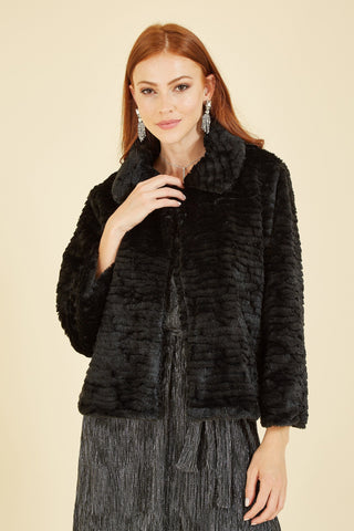 Yumi Black Faux Fur short jacket with hidden hook and eye fastening model shot