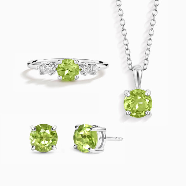 Peridot everyday jewellery set with sterling silver necklace, ring, and stud earrings in vibrant green gemstone