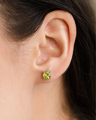 Woman wearing peridot stud earring from sterling silver everyday jewellery gift set