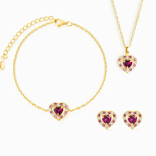 Red heart rhodolite garnet jewellery set with 18k gold vermeil necklace, bracelet, and earrings featuring pink rhodolites and simulated diamonds