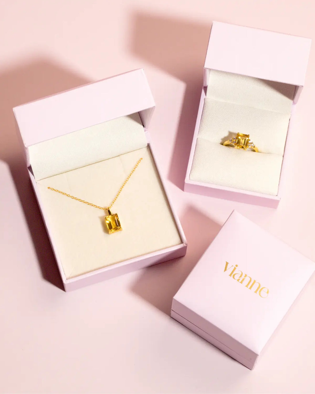 Blue sapphire and blue topaz pear cut half eternity band in 18k gold vermeil in pink jewelry box