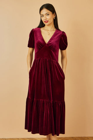 Yumi Burgundy velvet midi dress with V neckline and tiered skirt with pockets