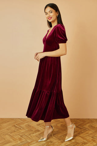 Yumi Burgundy Velvet Midi Dress with V neckline and tiered skirt in rich burgundy velvet