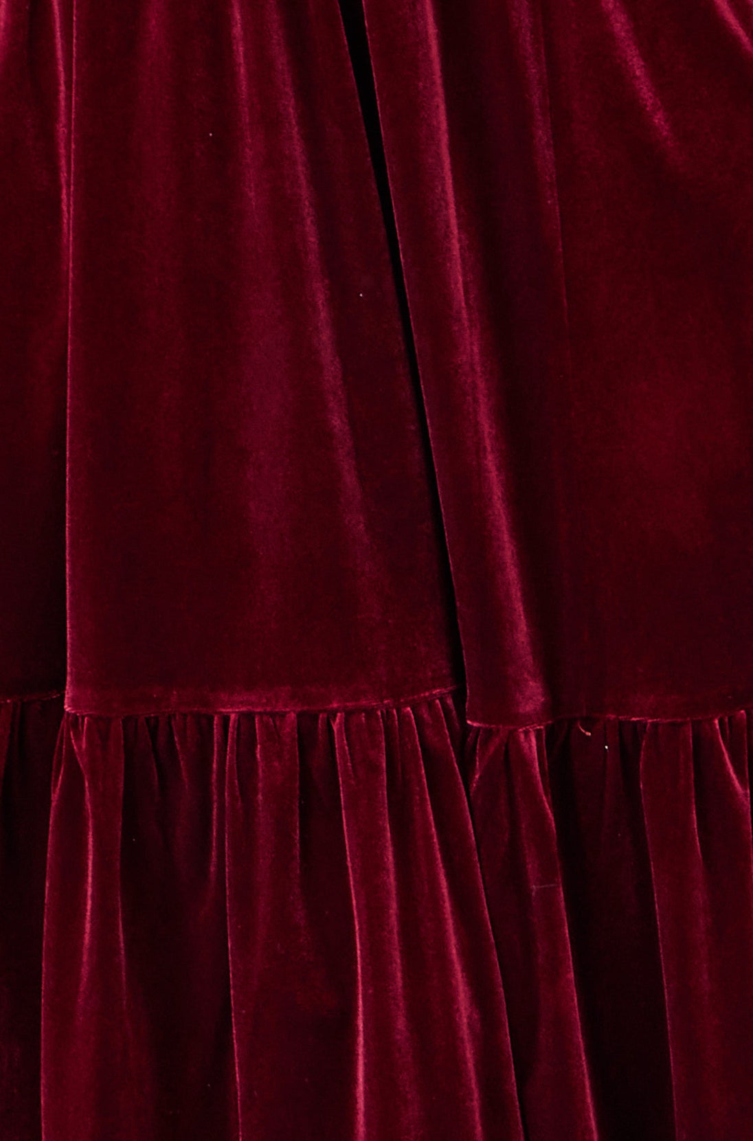 Yumi Burgundy Velvet Midi Dress with tiered skirt and pockets in rich burgundy color