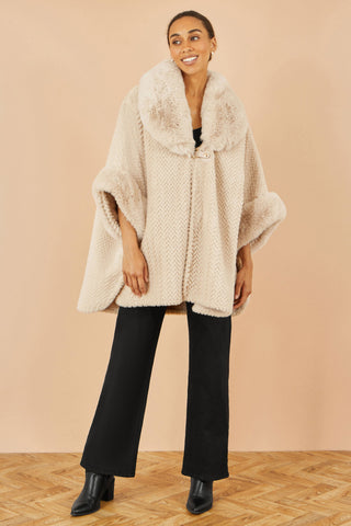 Yumi beige textured fur lined cape with oversized faux fur collar and buckle fastening