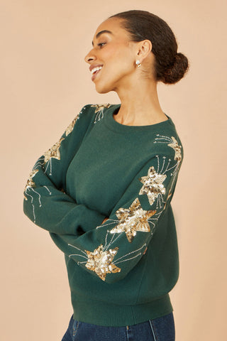 Yumi green relaxed fit jumper with sequin star sleeves on soft knitted fabric