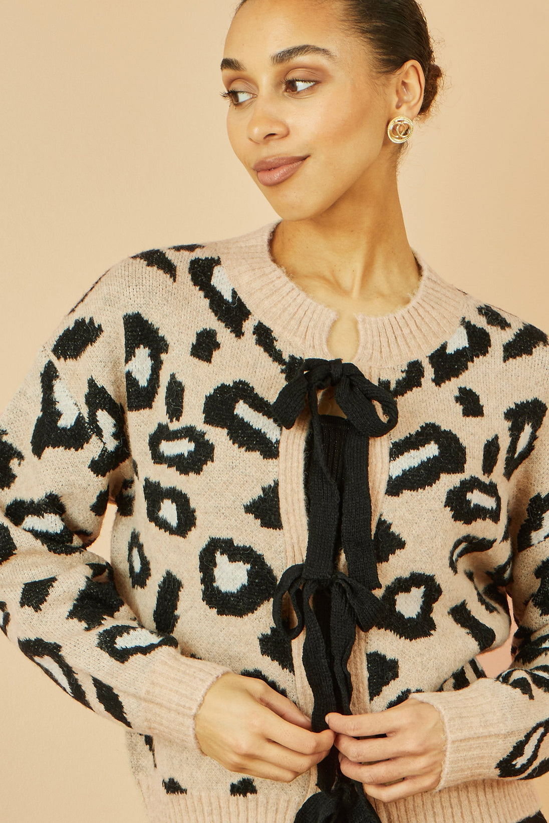 Yumi Beige Animal Print tie front cardigan in soft intarsia knit with oversized animal print design