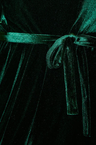 Yumi Green Velvet one shoulder midi dress with frill and split hem detail close-up of waist tie
