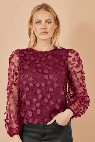 Yumi Burgundy Sheer Sleeve flower applique top with sheer floral sleeves for party season