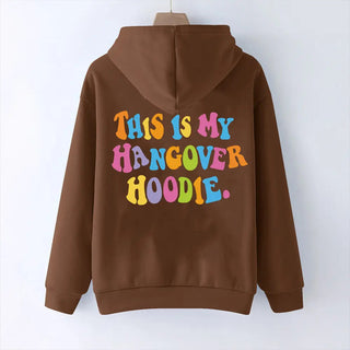 Brown oversized women's hoodie with colorful "THIS IS MY HANGOVER HOODIE" back print and drop shoulder design